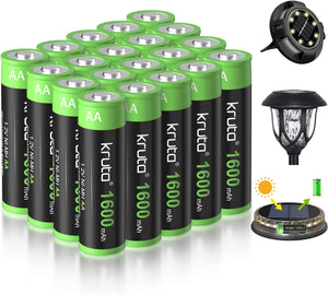 Multiple AA batteries with green and black labels, a solar panel, and a small light bulb on a white background.