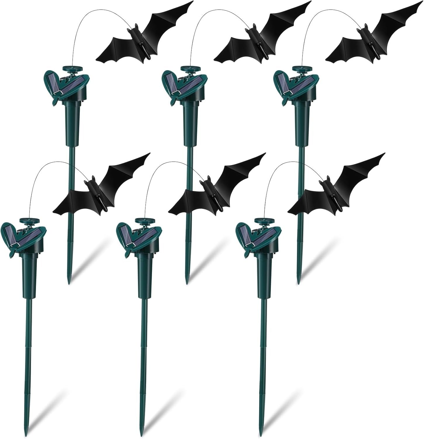 Set of Halloween bat decorations on sticks against a white background