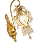 Gold earrings with intricate designs on a white background
