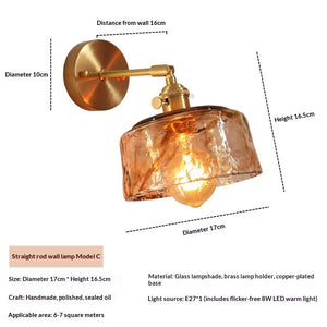 Modern wall-mounted brass sconce adding warm ambient light to home interiors