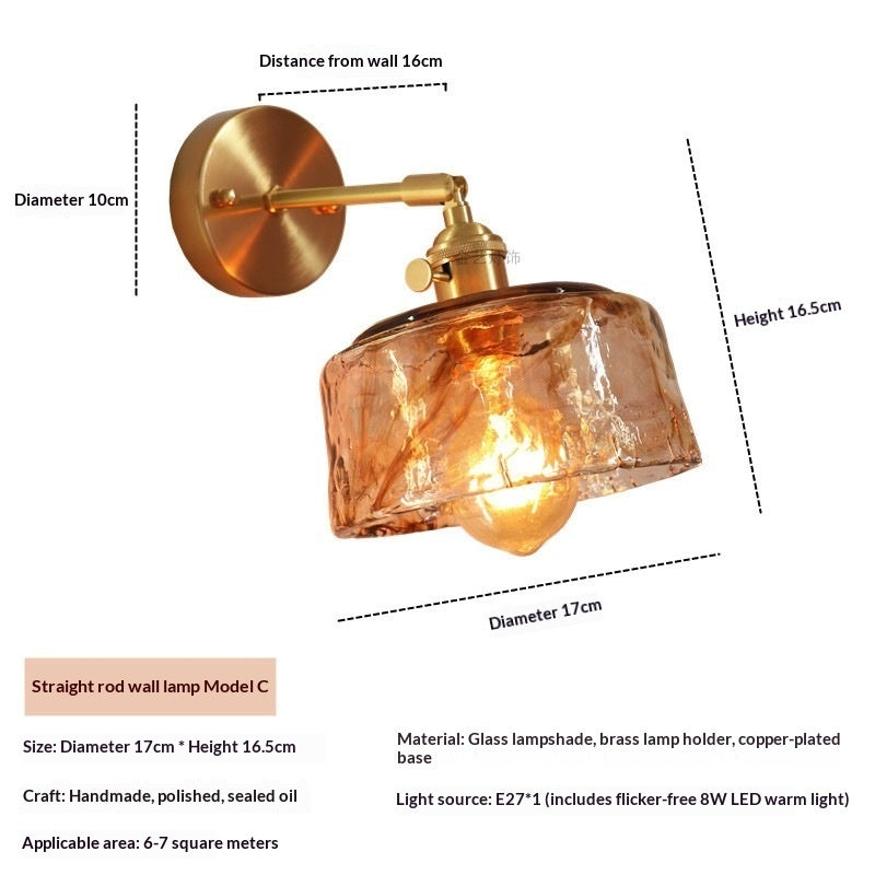 Modern wall-mounted brass sconce adding warm ambient light to home interiors