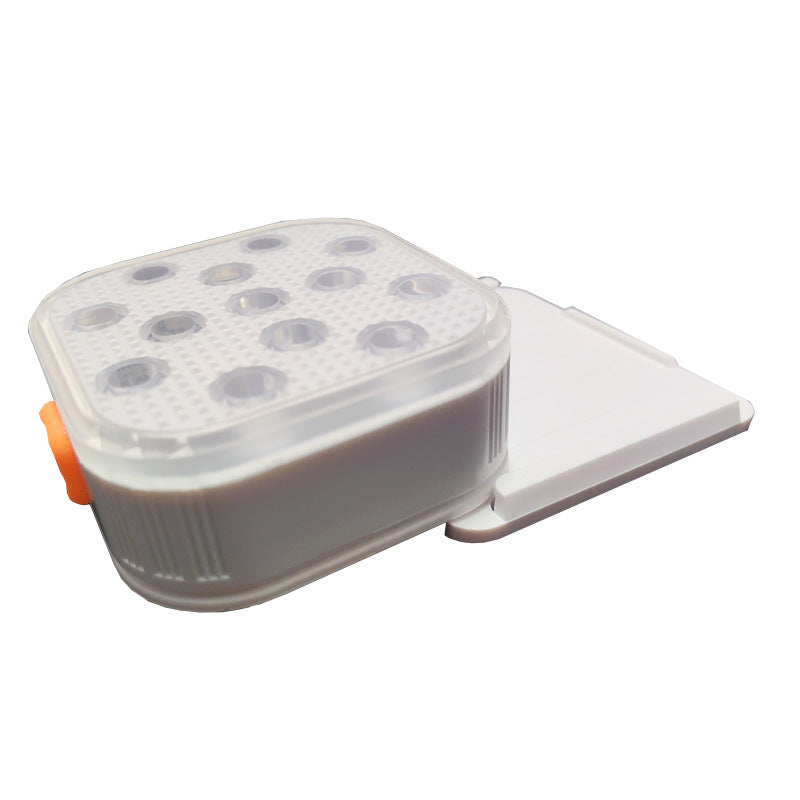 Close-up showing Nooriva magnetic pool light attached to metal pool wall.

