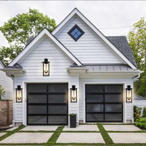 Outdoor wall lantern illuminating garden pathway