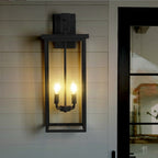Outdoor wall sconce installed on exterior wall during daylight