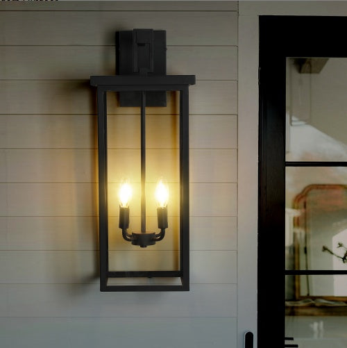 Outdoor wall sconce installed on exterior wall during daylight