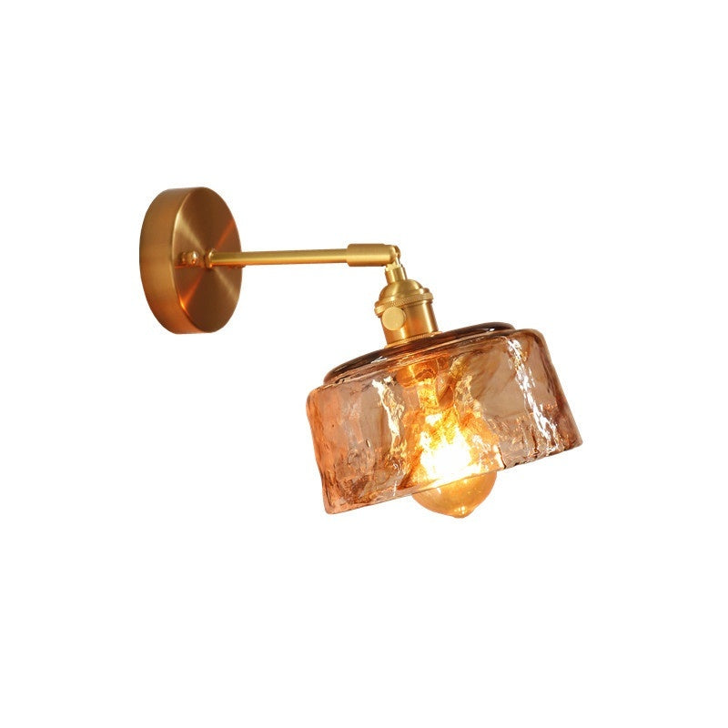 Elegant brass wall lamp with warm white LED illumination for indoor spaces