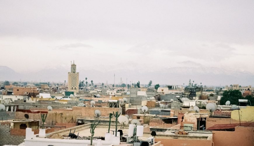 Marrakech Travel Guide with a view of the historic Medina and city rooftops